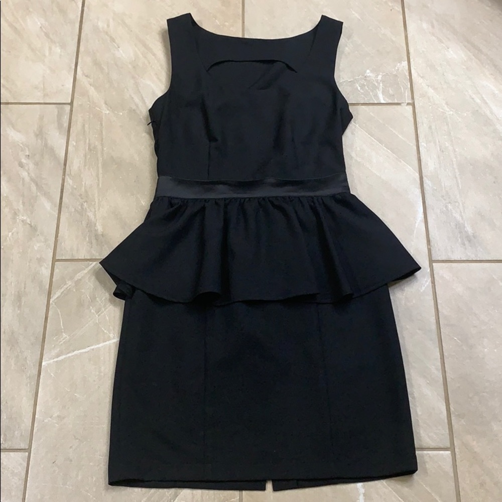 Peplum dress with butterfly tie at back